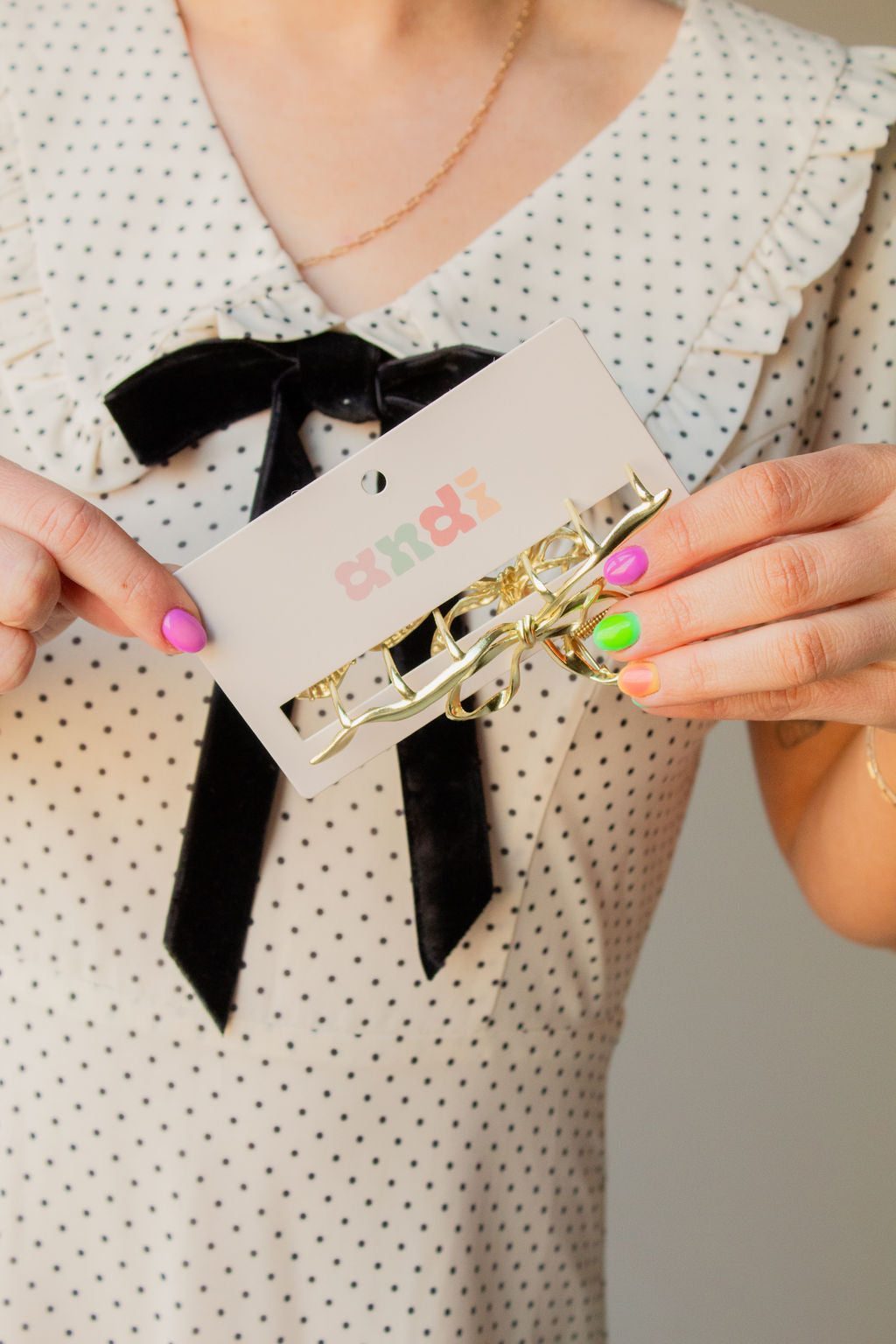 Gold Bow Squiggle Claw Clip